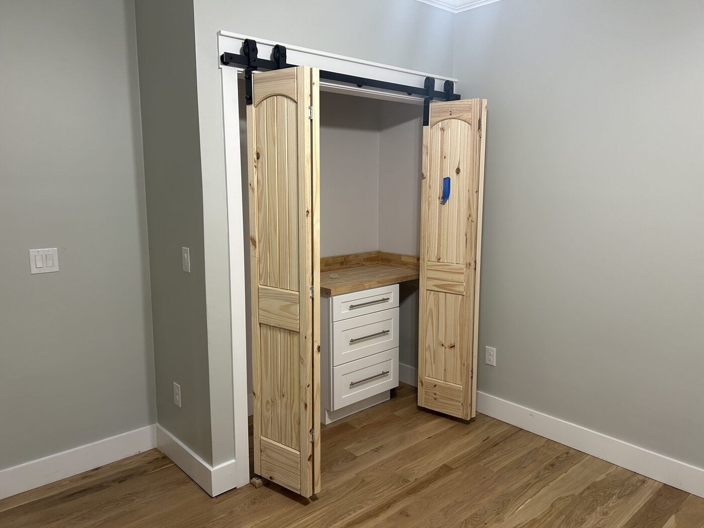 Custom closet built-in with barn doors